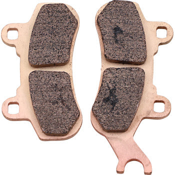 A pair of brown, rectangular ceramic Brake Pads by Galfer with metal backing plates, three mounting holes per pad, and textured surfaces for HH friction rating and dependable stopping power.