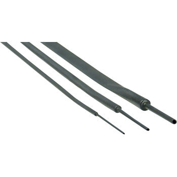 Three DEI Heat Shrink Tubes (3, 6, 9 mm x 4’) are arranged diagonally on a white surface, each tube narrowing around a wire to provide electrical insulation.