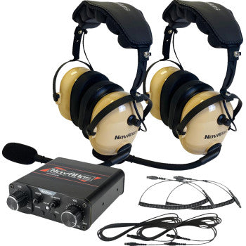 Two Navatlas Communication System Over the Head Headsets in beige, a black intercom control box with dials, and multiple audio cables are displayed on a white surface for high-fidelity stereo sound.