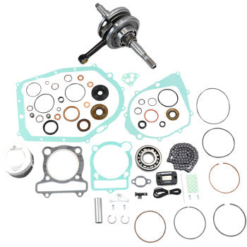 Complete engine rebuild kit with assorted gaskets, seals, rings, bearings, and a crankshaft for Yamaha YFM350 offroad ATV.