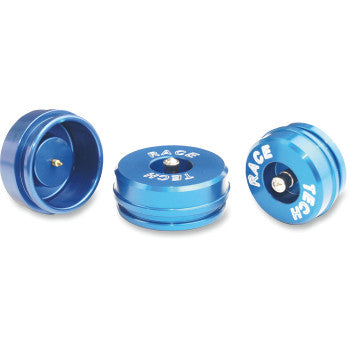Three blue, round 40mm R1 R6 Shock Reservoir Caps by Race Tech, each with white "RACE TECH" on top and a recessed Schrader valve for easy access, are shown from various angles against a white background.