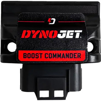 Black rectangular Dynojet Boost Commander electronic module with red and white logo and connector plug at bottom.