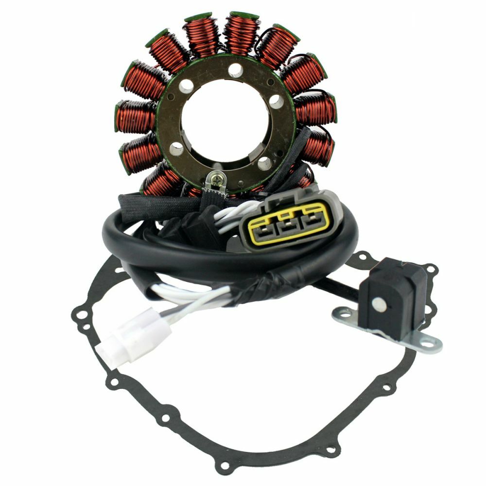 Round copper coil stator with black wiring harness and irregular black gasket for crankcase cover.