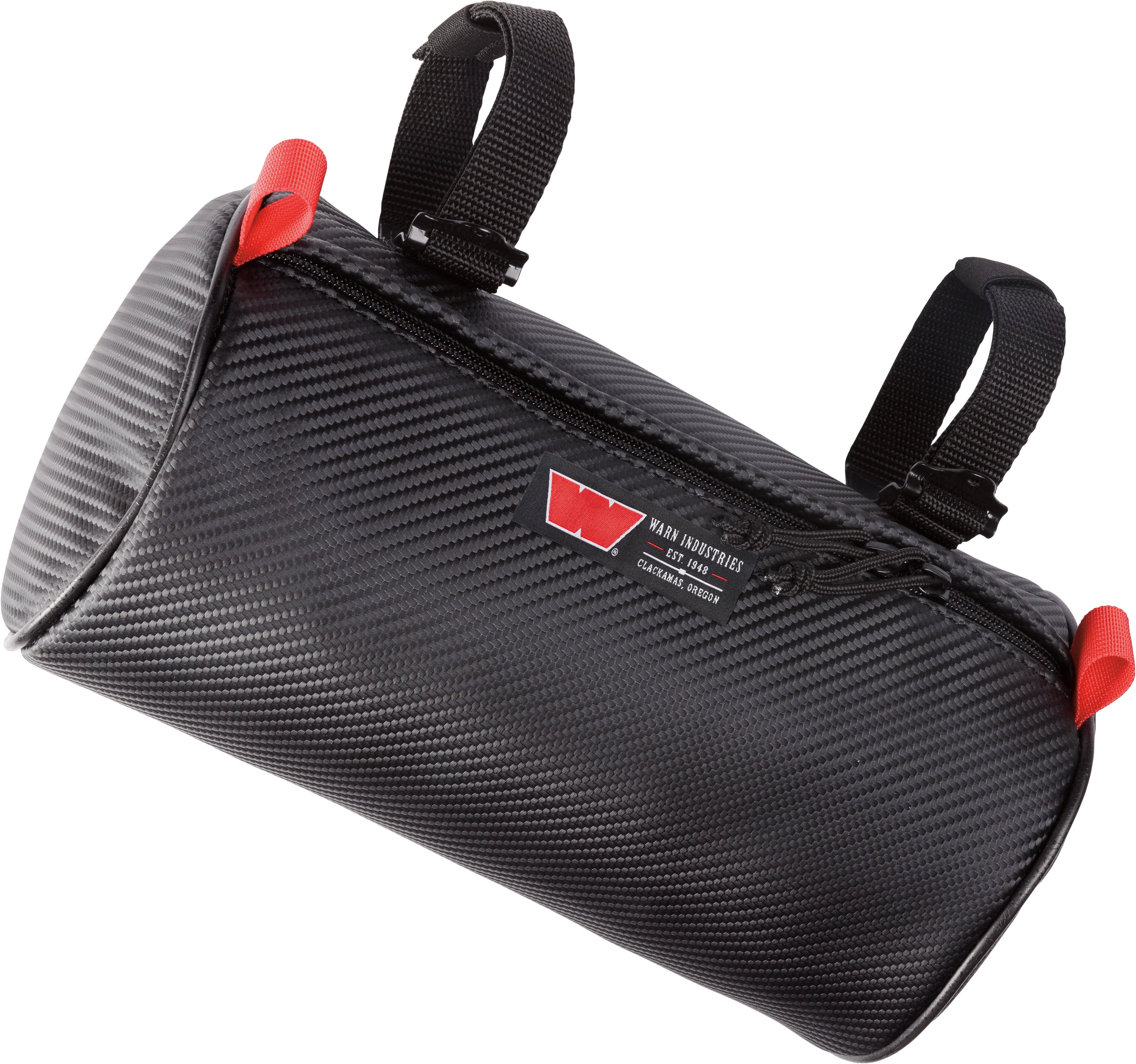 The Roll Bar Cylinder Bag Large by Warn is a black, cylindrical handlebar bag with a carbon fiber pattern, red accents, marine-grade water-resistant material, two black attachment straps, a top zipper, and a side label with the red W logo.