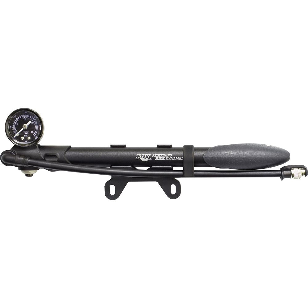 The Dual Stage Air Pump W/Bleed 300Psi by Fox is a black FOX suspension pump featuring a textured handle, attached pressure gauge, flexible hose for inflating shocks or forks, and displays the FOX Racing Shox logo on its body.