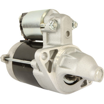 The Starter Motor by Parts Unlimited is shown at an angle, featuring a silver and black cylindrical body, mounting flange, and a solenoid on top, built to OEM specifications.