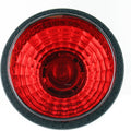 Round red Can-Am tail light assembly with textured lens and black outer rim.