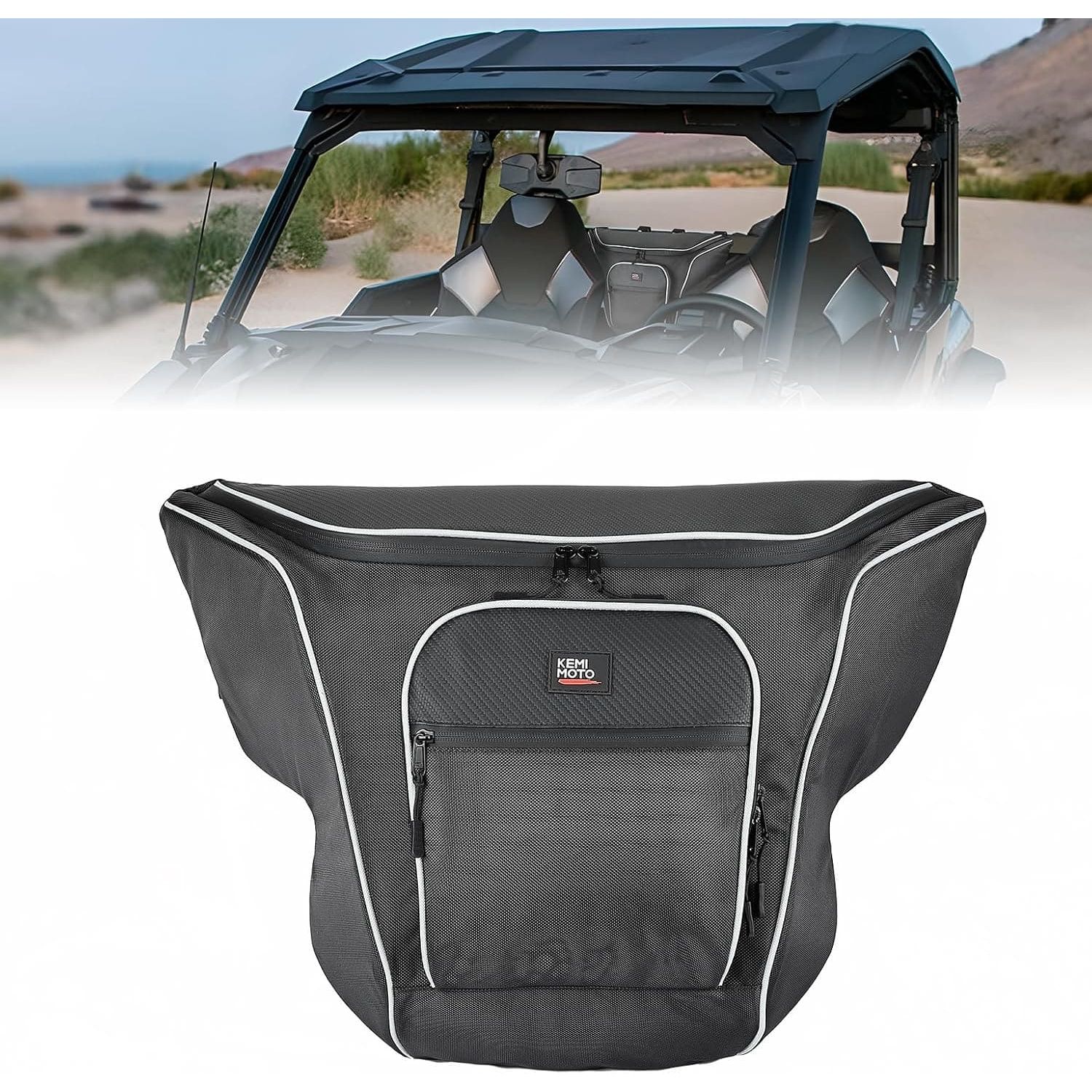 Polaris General 1000/XP 1000 UTV Center Seat Bag by Kemimoto shown with zippers in front of an off-road vehicle on a desert road, surrounded by greenery and mountains. Water resistant and ideal for rugged adventures.