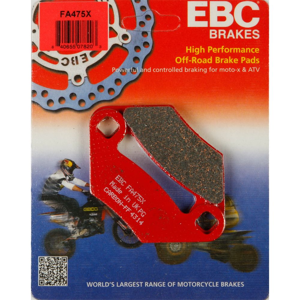 Red and black rectangular brake pad with rounded edges and mounting holes, displayed on EBC Brakes off-road packaging with.