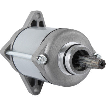 Silver and gray cylindrical starter motor with metal mounting bracket and exposed toothed shaft.