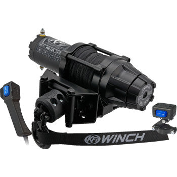 The 3500 lb AS-35 Assault Winch by Kfi Products features a black finish, synthetic cable, metal mounting bracket, branded KF WINCH strap, heavy duty electric contactor, and a wired remote with IN/OUT buttons.