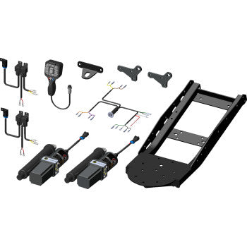 Digital illustration of the V-Plow Actuator Tube Kit with Remote by Kfi Products, showing two electric actuators, a metal bracket, wiring harnesses, Pro-V remote switch, and mounting hardware arranged on a white background.