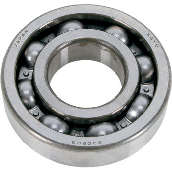 A close-up image of Yamaha Crankshaft Bearings by Hot Rods, displaying the circular outer and inner rings with metal balls in between; JAPAN KOYO and numbering are engraved on the outer ring.
