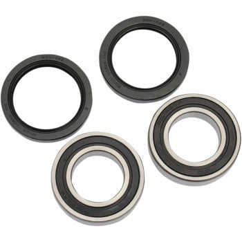 The Honda TRX Wheel Bearing Kit Rear by Pivot Works includes four circular bearings—two with black outer rings and two with black inner rings and silver outer rings—arranged on a white background, perfect for precision steering or wheel applications.