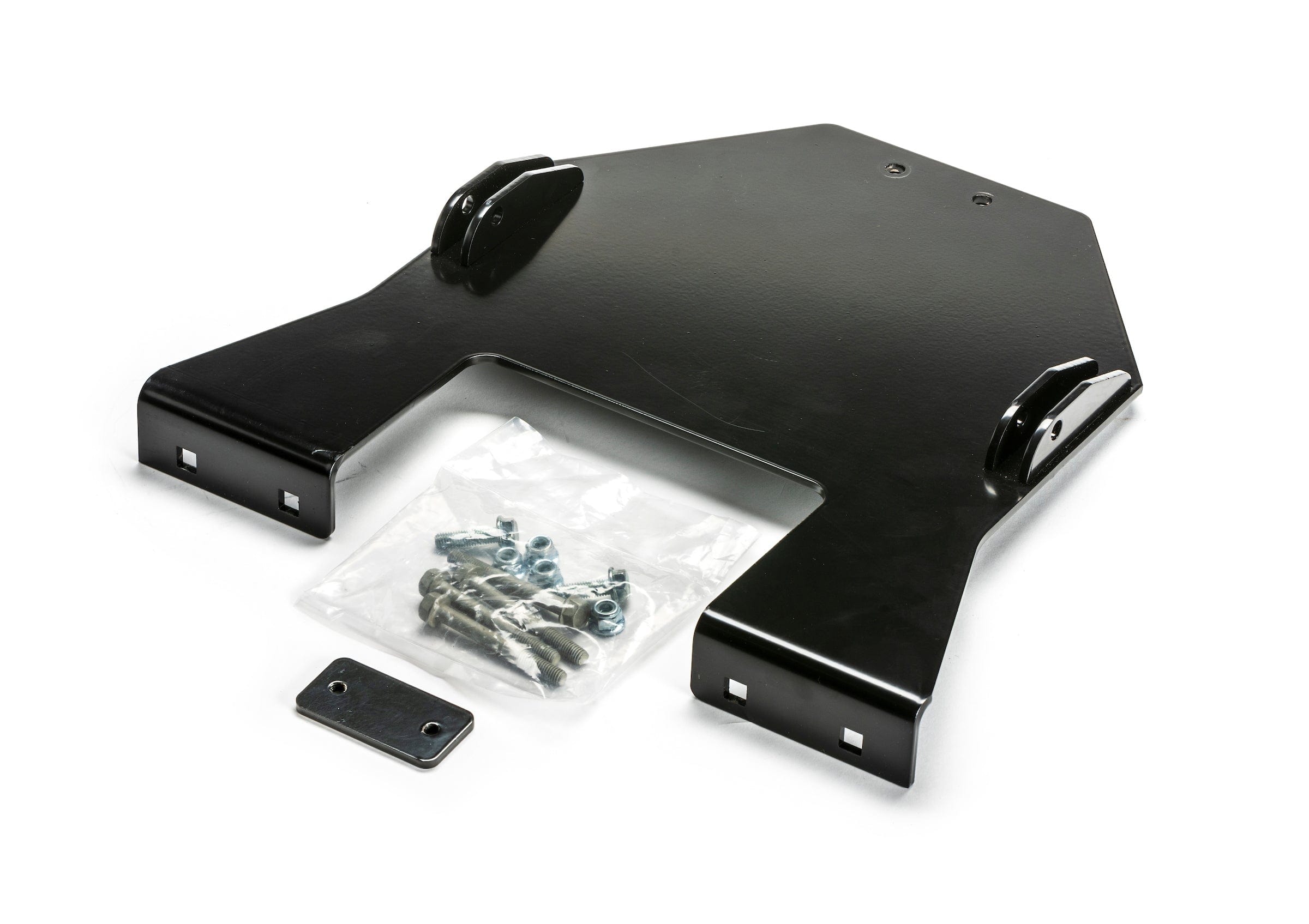 The Can-Am Outlander (2021) Provantage Center Snow Plow Mounting Kit by Warn features a black metal bracket and small rectangular plate, plus a plastic bag of screws and bolts, all shown on a white background.