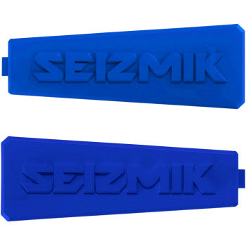 Pair of bright blue rectangular plastic inserts with raised Seizmik logo embossed on each piece.