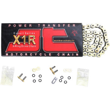 The 520 X1R Heavy Duty Drive Chain 114 Links Gold by JT Chains comes with a superbike chain, master link, O-rings, connecting clips, and small hardware, shown in front of a black and red X1R X-Ring Drive Chain box.