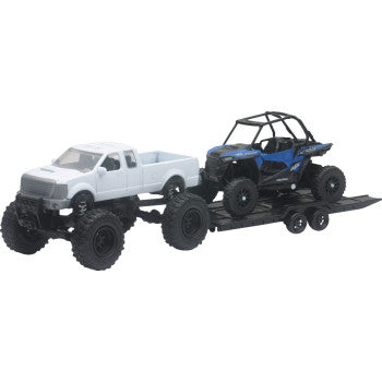 A Polaris RZR XP Pick Up in black, white, and blue by New Ray Toys tows a matching 1000 EPS UTV on a black trailer.