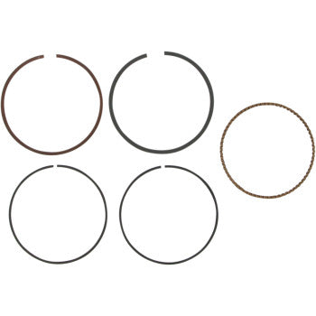 Five circular rings from the Ring Set by Wiseco are displayed on a white background: four solid metallic rings with small gaps and one thinner, textured ring.