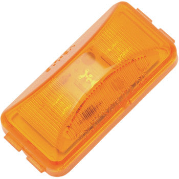 The LED Trailer Light Rectangle Amber by Brite-Lites is a plastic lens cover for trailer lights, featuring textured ridges and side mounting clips.