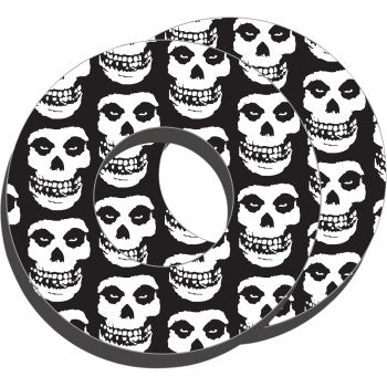 Black and white donut-shaped grip with repeating skull pattern, made from durable rubber material.