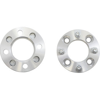 The Spacer Wheel 1.50 4/110 Pair by High Lifter features two round, silver billet aluminum wheel spacers; one with bolts installed and one without, perfect for securing aftermarket tires on your vehicle.