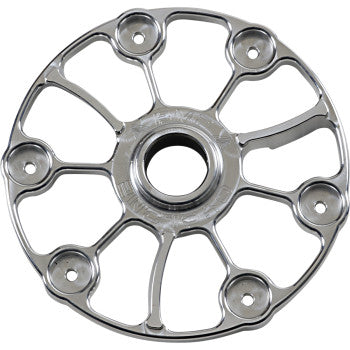 The Cyclone Clutch Cover by Bikeman Performance features a shiny billet aluminum design with six spokes and six evenly spaced outer holes around a central opening, resembling a wheel hub, and is engineered for efficient cooling.