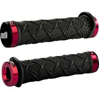 Grips Xtreme Lock-On Black / Red by Odi: Two black handlebar grips with a diamond-textured surface and red metallic lock-on rings, featuring the ODI logo and ensuring superior grip and slip-free control.