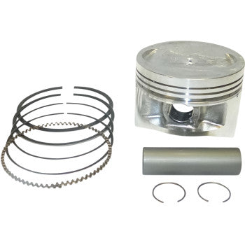 The Yamaha Piston Kit 83.50 mm by Wsm includes a silver piston, four piston rings, a wrist pin, and two retaining clips, all displayed on a white background.