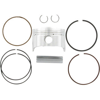 The Honda Piston Kit 74.00 mm by Wiseco is shown, including a forged 4-stroke piston, wrist pin, two circlips, and multiple piston rings arranged neatly on a white background.