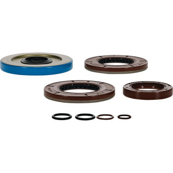 The Polaris Transaxle Seal Kit by Moose Offroad includes circular oil seals and O-rings in assorted sizes and colors—blue, brown, and black—neatly arranged on a white background. Ideal for oil leak repairs.