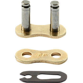 The 520 MX Clip Connecting Link Gold by Prox includes three parts: a gold master link plate with two pins, a matching Japanese steel plate marked Japan, and a small black retaining clip.