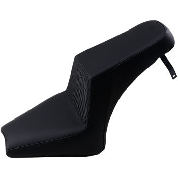 The Step-Up Seat - Gripper - Black by Saddlemen features a stylish black design with an elevated step-up shape and rear mounting strap, delivering both comfort and support for your ride.