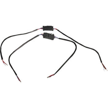 Two Custom Dynamics Universal Wire Connectors—Quick Disconnect style in black—with colored wire ends, arranged on a white background.