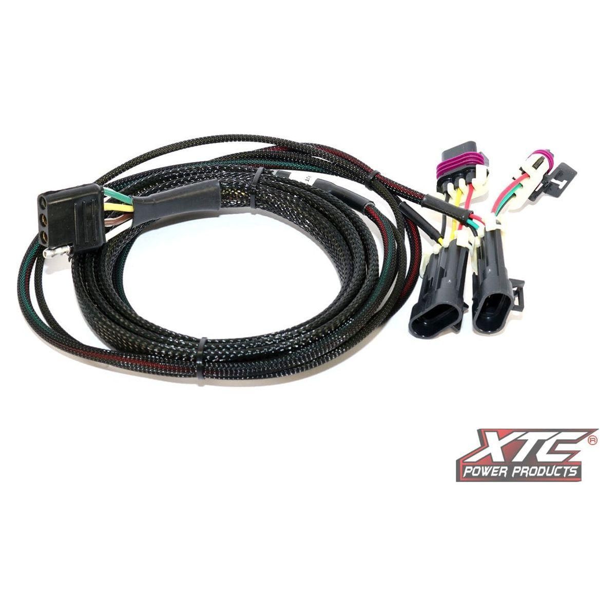 The Plug N Play Power Out 4 Pin Flat Hon by XTC Power features a black, coiled wiring harness with connectors and color-coded wires, multiple plug ends, and displays the XTC Power Products logo in the lower right corner.