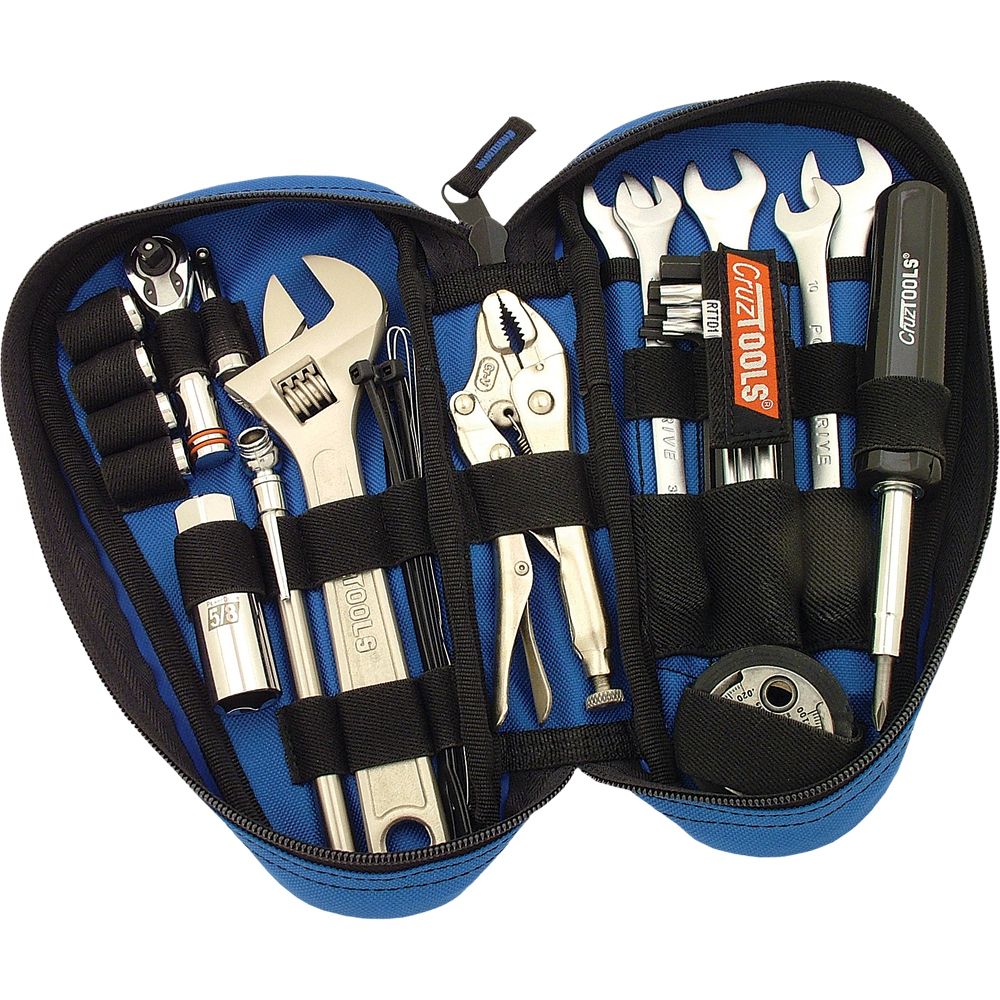 The Roadtech Teardrop Tool Kit by Cruz Tools, in blue and black, unzips to reveal wrenches, pliers, a screwdriver, ratchet, adjustable wrench, and sockets—all neatly organized in elastic loops for roadside repairs.