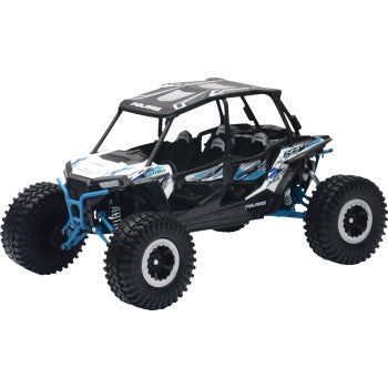 The Polaris RZR XP 4 Turbo EPS Rock Crawler 1:18 Scale White Lightning by New Ray Toys features large rugged tires, black frame, blue and white details, open sides, and a roll cage—perfect for off-road toy collectors.