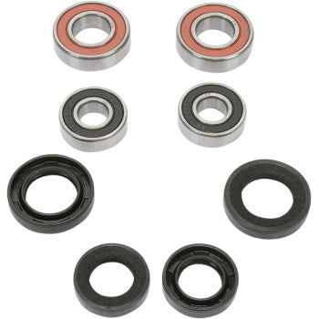 Set of six round wheel bearing and seal components in black and metallic silver with red and black inner rings.