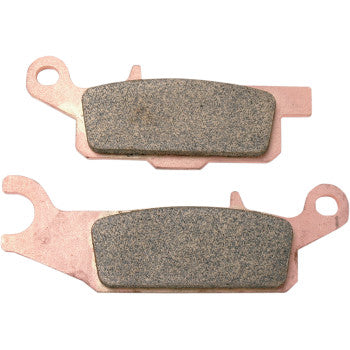 Pair of rectangular Yamaha off-road sintered brake pads with copper backing plates and textured friction surfaces.