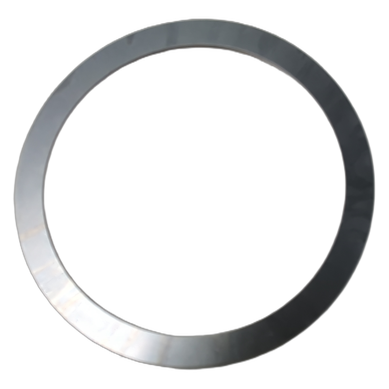 Thin silver metallic shim washer with smooth flat surface and circular shape.