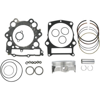 The Yamaha Piston Kit with Gasket 100.50 mm by Wiseco includes a piston, piston rings, gaskets, circlips, wrist pin, seals, and O-rings—all displayed on a white background.