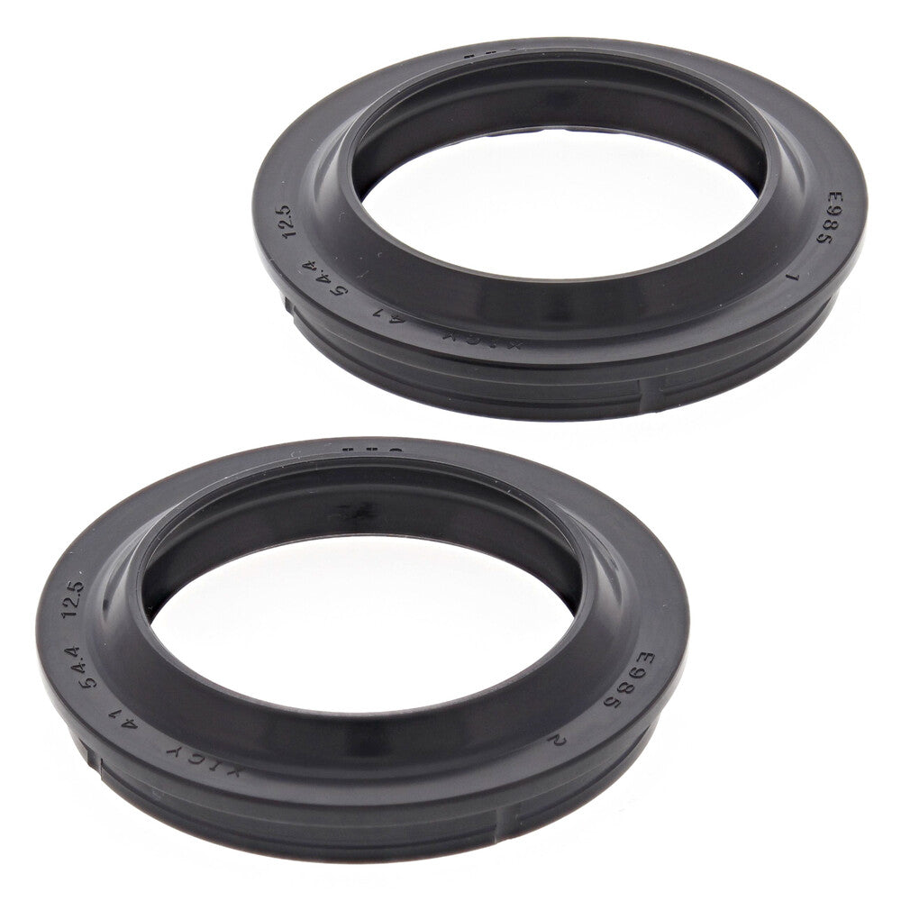 Two black rubber fork dust seals with textured edges and raised markings around the circumference.