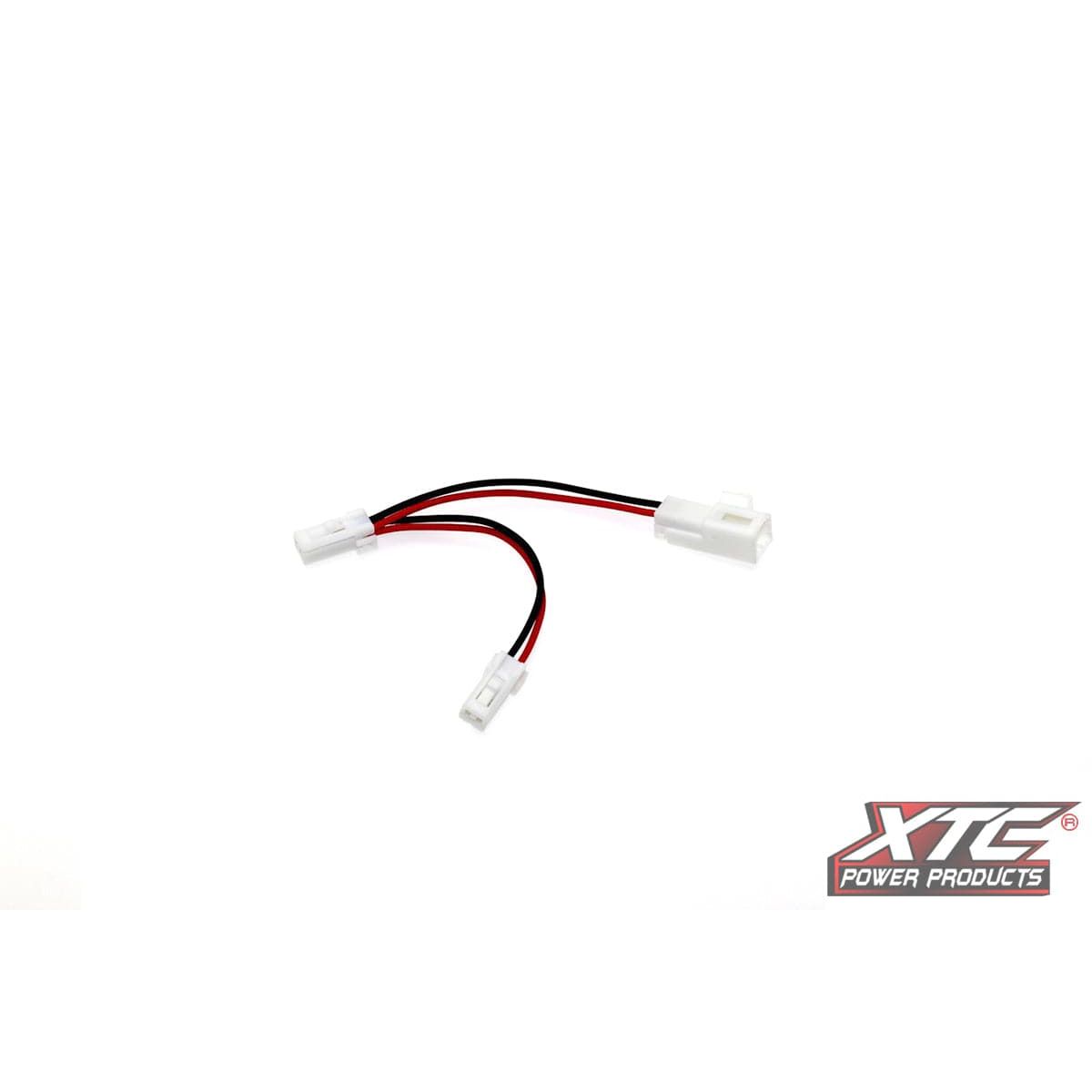 The Plug N Play Power Out Aux Splitter by XTC Power features red and black wires, white plastic plugs, and appears on a white background with the XTC Power Products logo in the lower right corner.