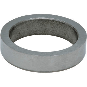 A cast iron valve seat by Kibblewhite, shown at an angle to highlight its thickness and inner edge, demonstrates the precision achievable with advanced manufacturing.