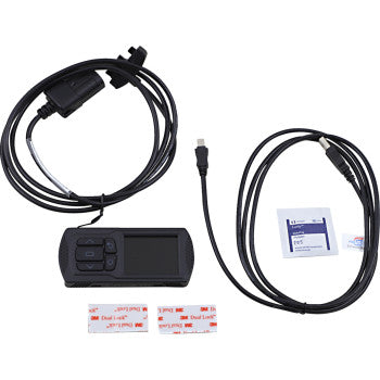 Black handheld ECU tuner with screen and buttons, paired with two black cables and adhesive pads.