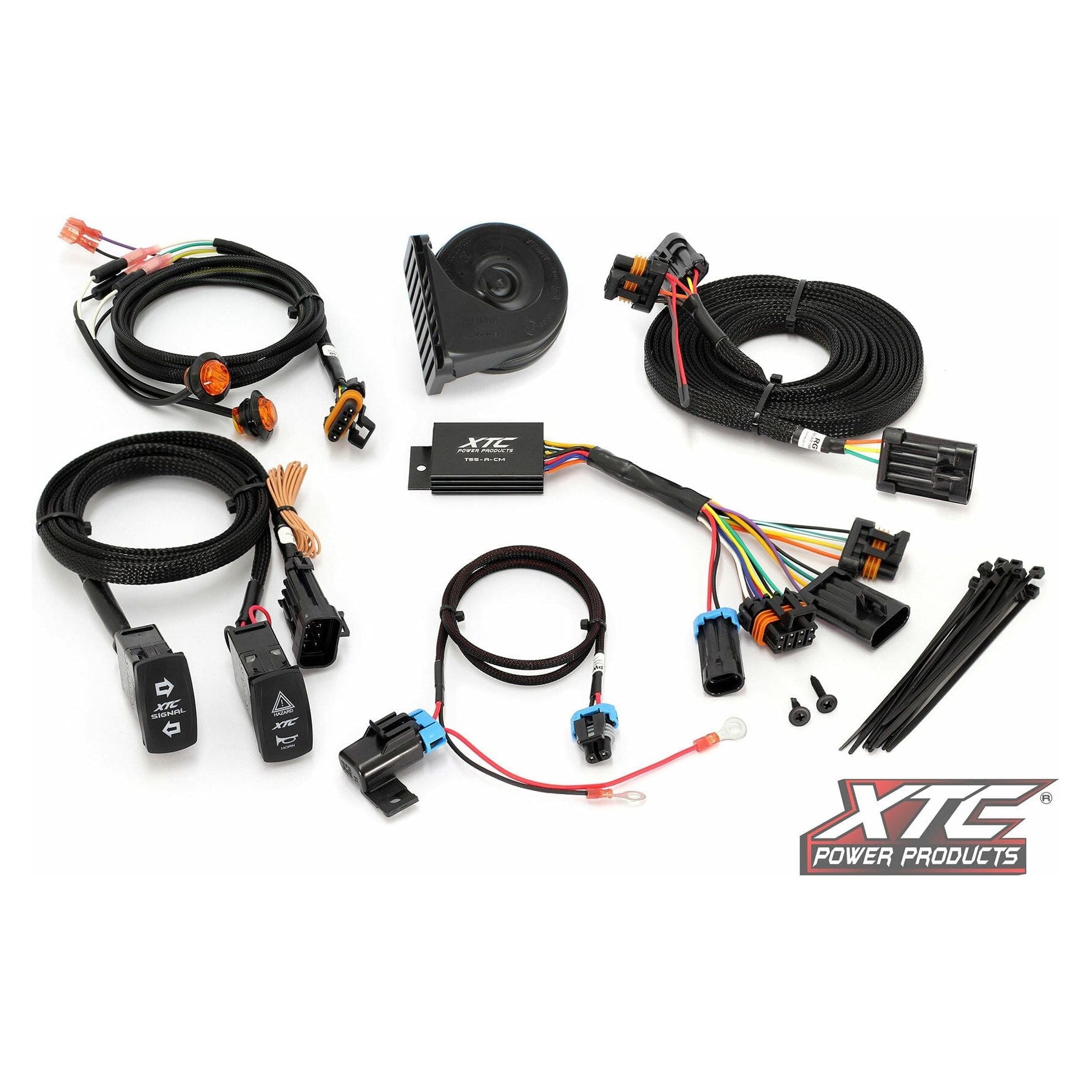 A complete Plug and Play Self Canceling Turn Signal Kit Pol by XTC Power is displayed, featuring wiring harnesses, switches, connectors, relay, fuse, zip ties, mounting hardware, and the XTC Power logo in the bottom right corner.