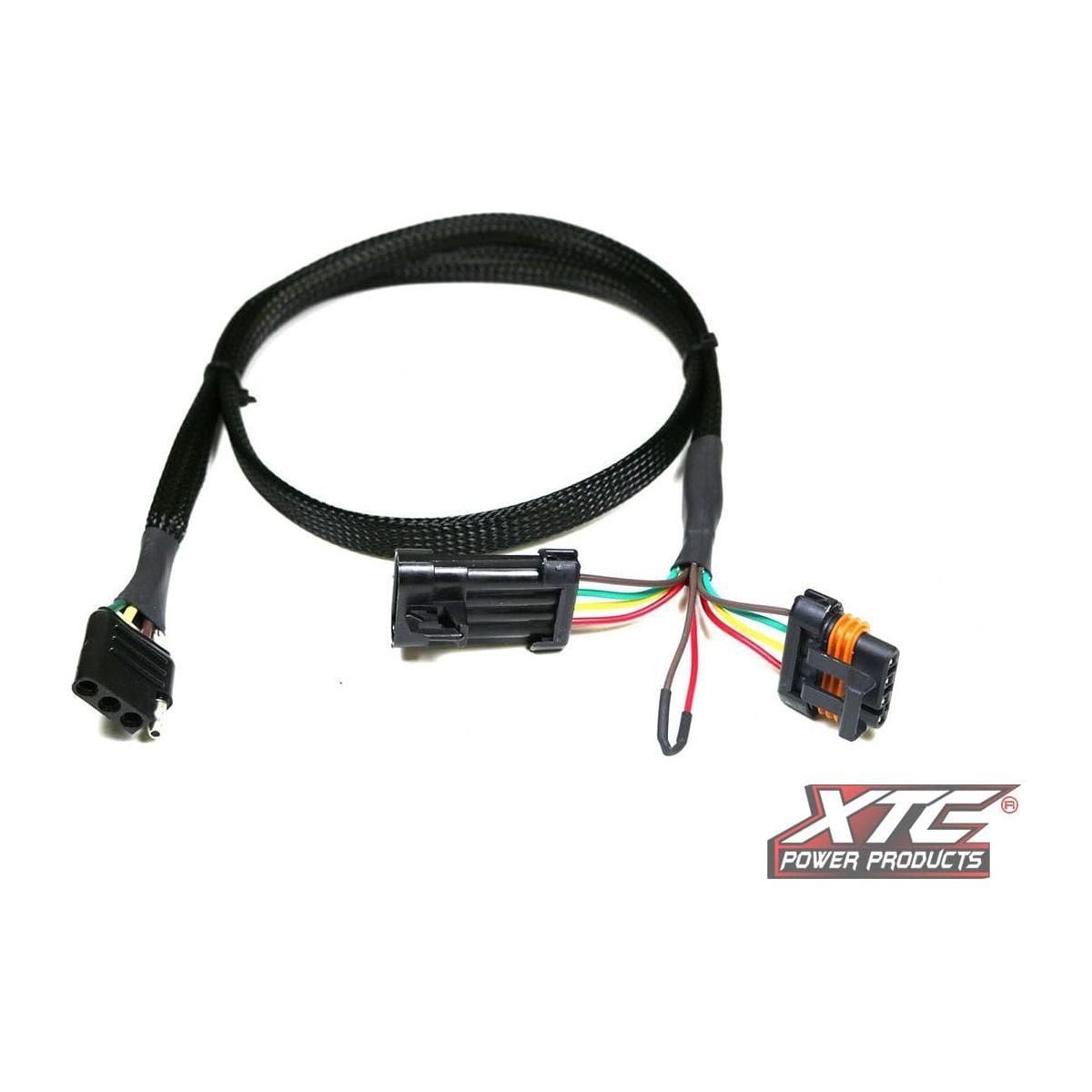 The Plug N Play 4 Pin Trailer Light Adapter by XTC Power, in black, features three connectors with colored wires and is shown on a white background with the XTC Power Products logo.