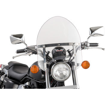A close-up front view of a motorcycle features the Police Windshield - Clear by Slipstreamer, two round side mirrors, orange turn signals, a central headlight, visible handlebars with universal clamp, and part of the black seat.