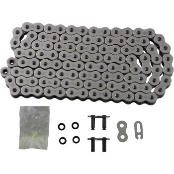 The 520 X1R3 Chain Nickel 106 Link by JT Chains is coiled in a flat loop, with two black O-rings, two metal pins, a master link, and a small plastic bag of motorcycle chain components placed below it.