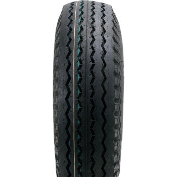 A close-up of the Tire 5.70-8 4 Ply by Kenda shows its black tubeless nylon build, classic zigzag tread, and a thin colored center line, displayed upright against a white background.